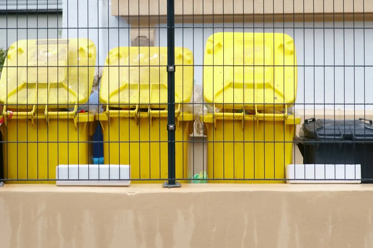 Yellow garbage cans