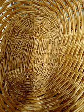The bottom of a wicker basket made of sedge