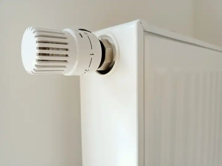 New white radiator for heating room in a house