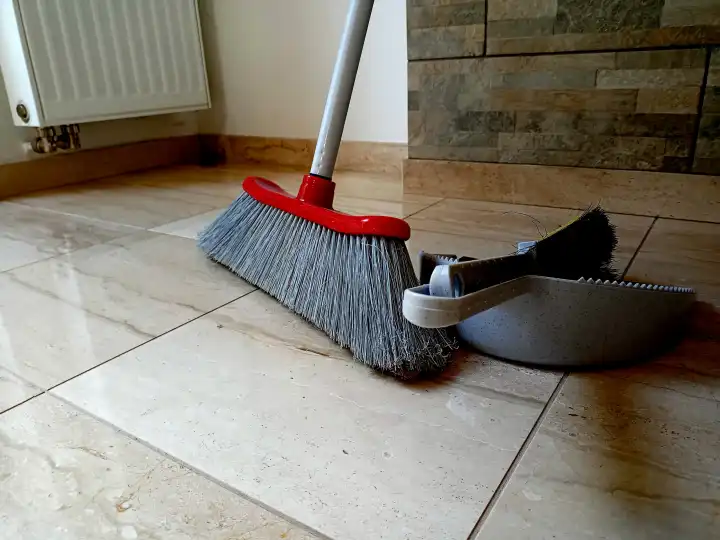 Sweeper on floor in a room