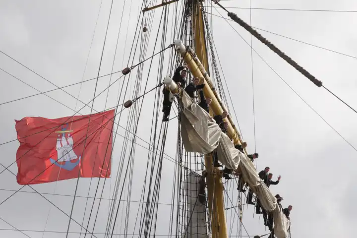 The trainig sailing ship Gorch Fock at the 824 Hamburg harbour festival with Harbour Hambrg Flag