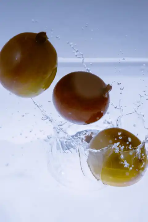 3 Gooseberries fall into the water