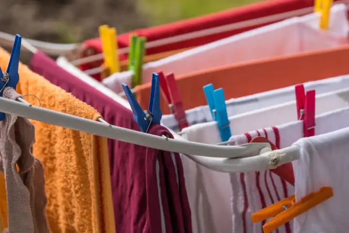 Clothespins hold on clothes horse textiles for air drying - detail