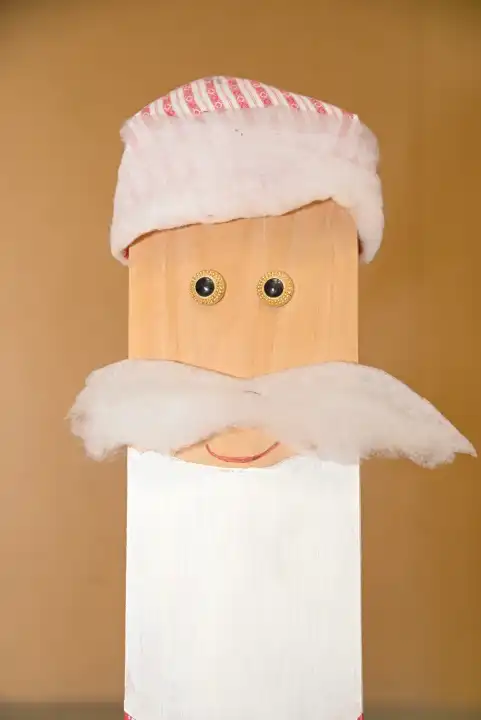 Wooden figure and decoration with mustache and pointed hat