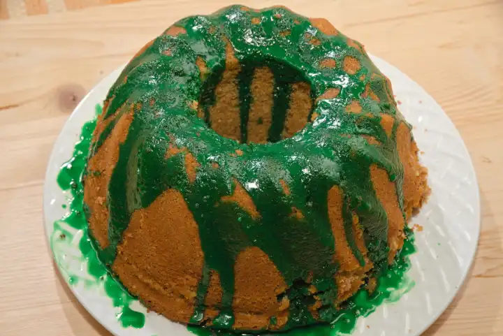 Green glaze on a bundt cake - red wine bundt cake, sponge cake for dessert