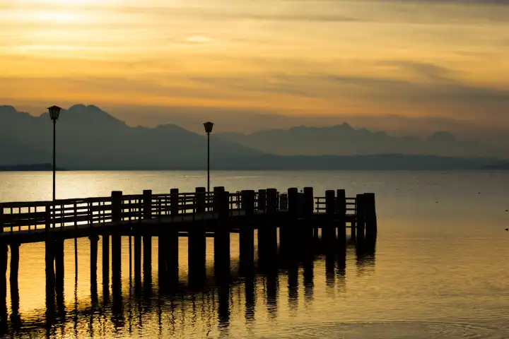 Jetty on Lake Chiemsee in the sunset