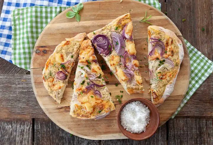 Flammkuchen with sour cream and onions