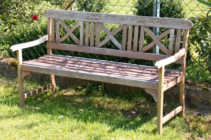 wooden bench in a garden