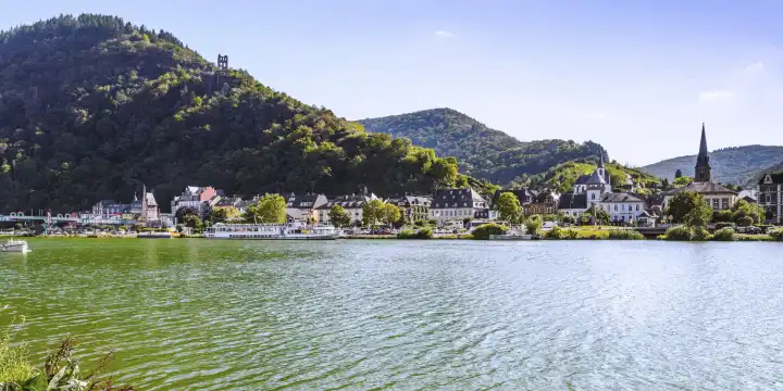 panorama of the town Traben-Trarbach on the river bank of the Moselle river, Germany, with Bridge Gate, Brückentor, ruin Grevenburg and steep slopes
