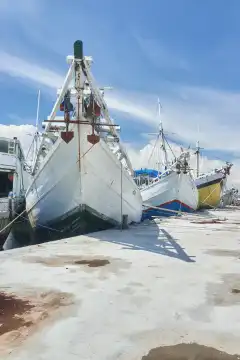 Traditional ships, so-called Pinisi, moored in the harbor of Makassar, Sulawesi, Indonesia