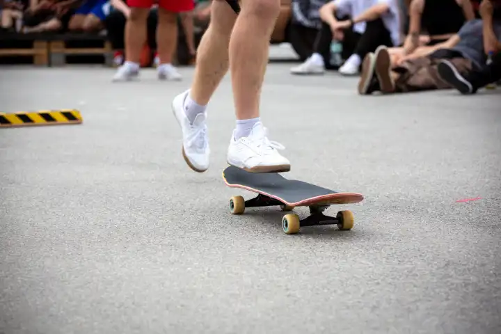 Skater jumps on his skateboard