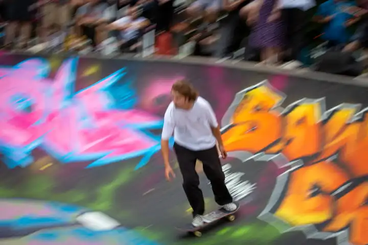 skaters in action at the endless grind at skatepool