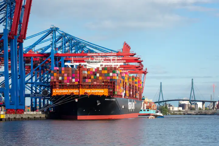 Container ship in the Port of Hamburg at Burchardkai promotes a cleaner future in shipping.