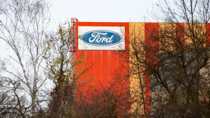 Company sign on the Ford factory building in Cologne. Ford, Fordwerk in Cologne, company logo, car brand
