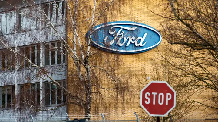 Company sign on the Ford factory building in Cologne. Ford, Fordwerk in Cologne, company logo, car brand