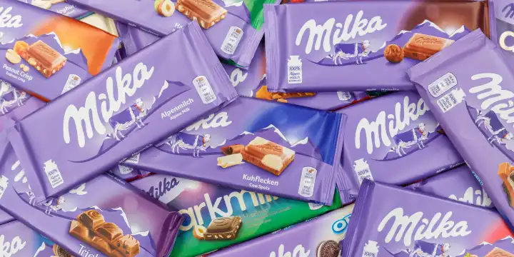 Milka Schokolade Schokoladen verschiedene Sorten Hintergrund Banner