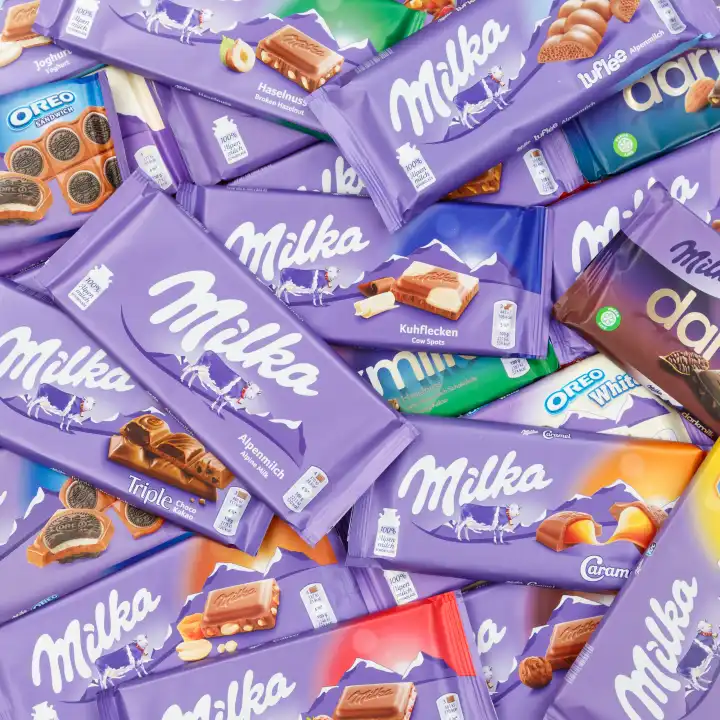 Milka Schokolade Schokoladen verschiedene Sorten Hintergrund quadratisch