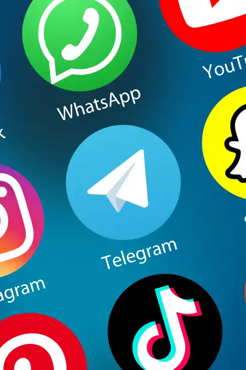 Telegram logo social media icon social network on internet background portrait in Germany
