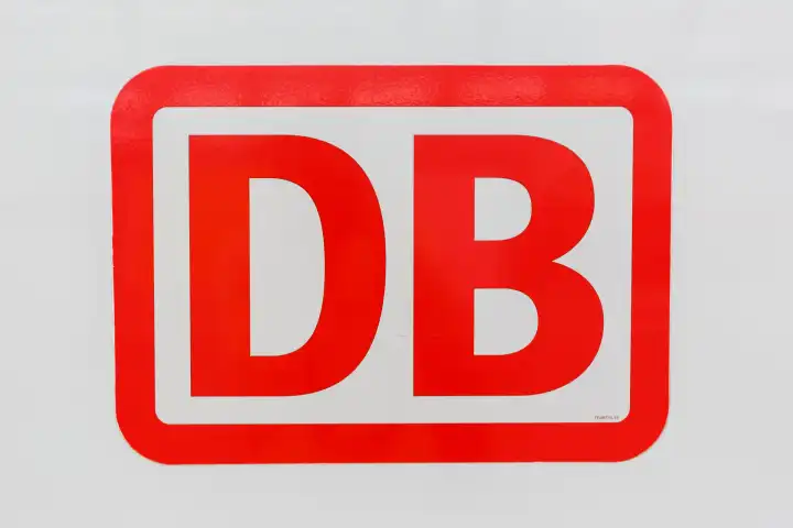 Karlsruhe, Germany - June 30, 2021: DB Deutsche Bahn logo sign on an InterCity IC train at Karlsruhe main station, Germany.