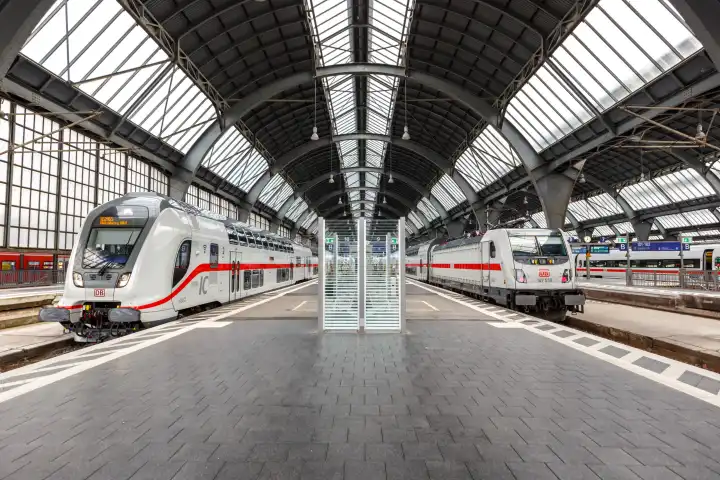 Karlsruhe, Germany - June 30, 2021: DB Deutsche Bahn's Twindexx Vario InterCity IC trains at Karlsruhe Central Station, Germany.