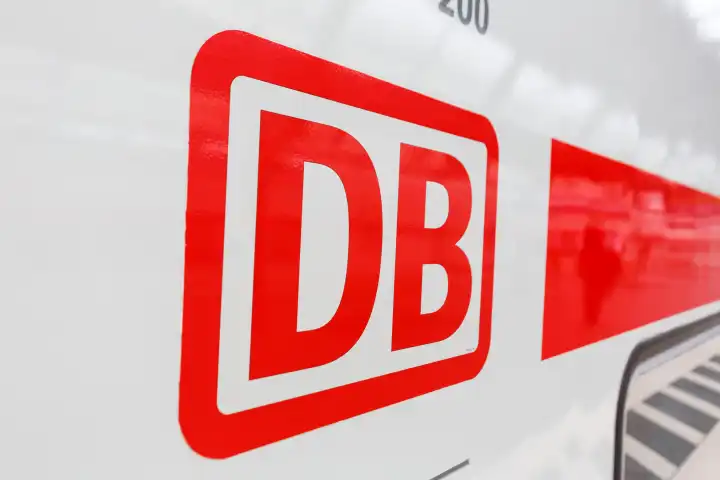 Karlsruhe, Germany - June 30, 2021: DB Deutsche Bahn logo sign on an InterCity IC train at Karlsruhe main station, Germany.