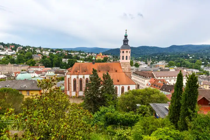 Baden-Baden, Germany - June 30, 2022: View of city Baden-Baden in Black Forest with church in Baden-Baden, Germany.