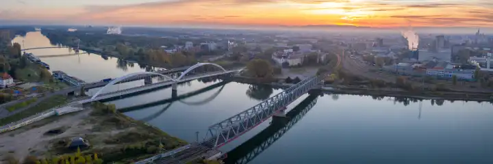 Kehl, Germany - October 29, 2021: bridges bridge over river Rhine between Germany and France aerial panorama in Kehl, Germany.