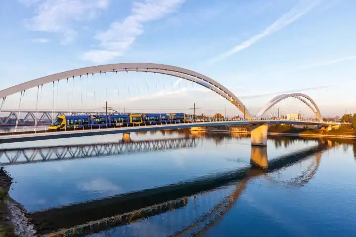 Strasbourg, France - October 29, 2021: Beatus Rhenanus bridge for tramway over river Rhine in Strasbourg, France.