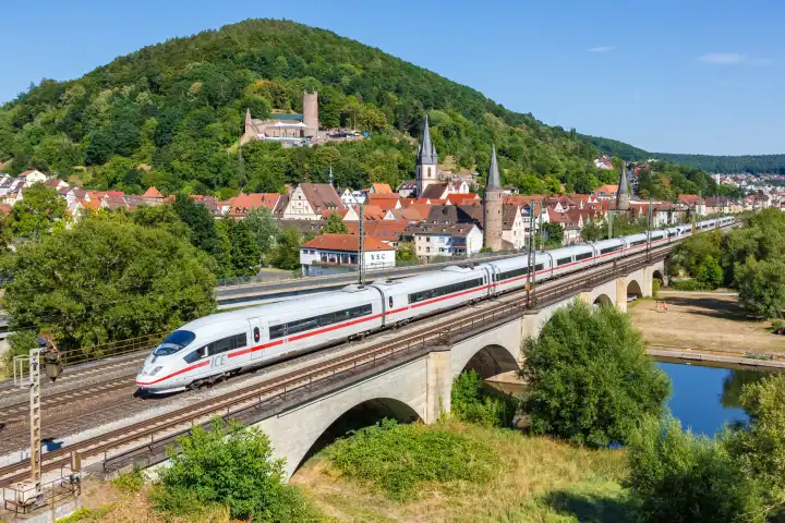 Gemünden am Main, Germany - August 3, 2022: Deutsche Bahn DB ICE 3 high speed train in Gemünden am Main, Germany.