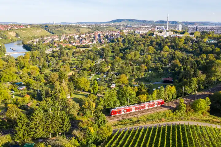 Stuttgart, Germany - October 1, 2021: DB Deutsche Bahn train regional train on Schusterbahn aerial view in Stuttgart, Germany.