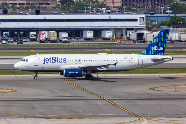 New York, USA - May 12, 2023: A JetBlue Airbus A320 aircraft with registration N587JB at New York John F Kennedy (JFK) Airport in the United States.