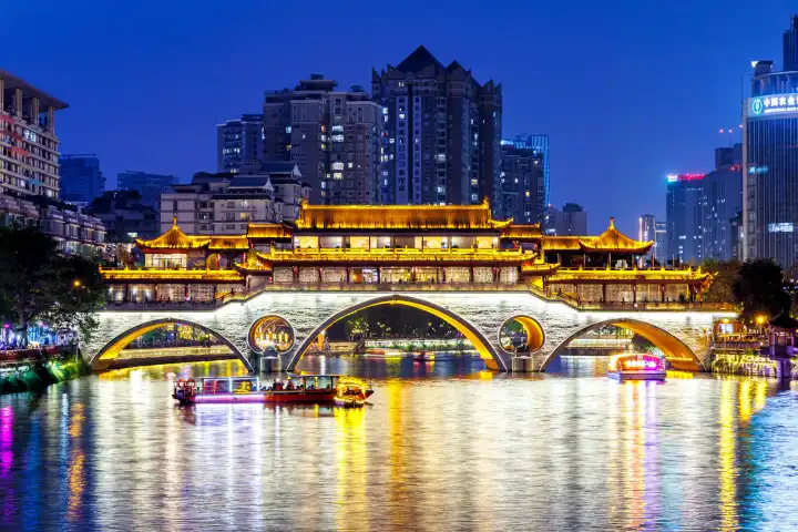 Chengdu, China - April 7, 2024: Chengdu Anshun Bridge over Jin River at night in Chengdu, China.