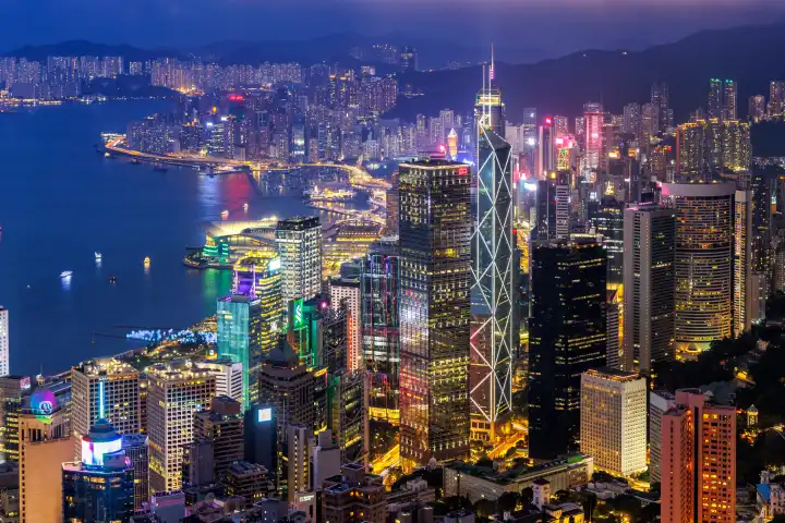 Hong Kong, China - April 4, 2024: Hong Kong skyline with skyscrapers downtown Central District at night in Hong Kong, China.