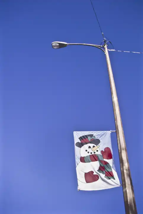 Christmas flag on a lamp post