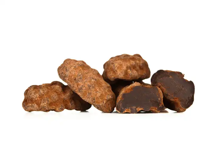 Cocoa beans, dark chocolate on white background