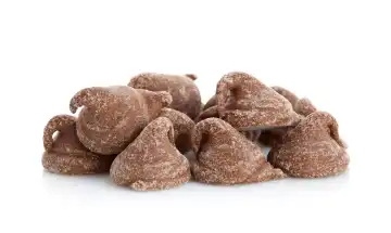Chocolates for dogs on white background