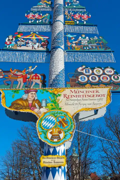 Traditional Bavarian maypole , Viktualien market, Munich, Germany