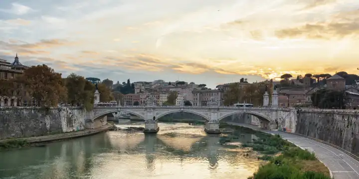Bridge of Vittorio Emmanuel II on Tiber River and StPeter's Basilica, Rome Italy