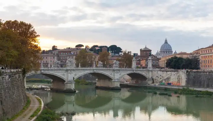 Bridge of Vittorio Emmanuel II on Tiber River and StPeter's Basilica, Rome Italy