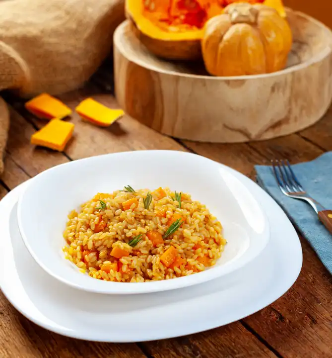 Delicious pumpkin risotto with parmesan cheese. Recipe idea for halloween.
