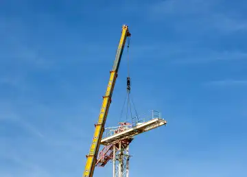Disassembly of a construction crane.