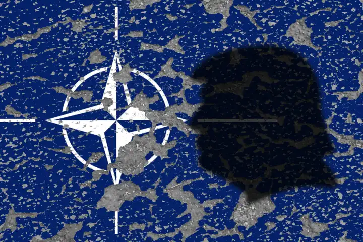 Donald Trump shadow with eroding NATO OTAN sign