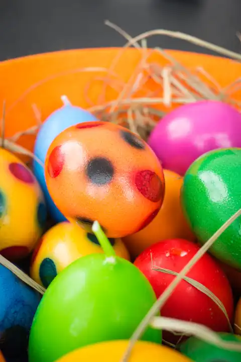 colorful eggs in Easter basket