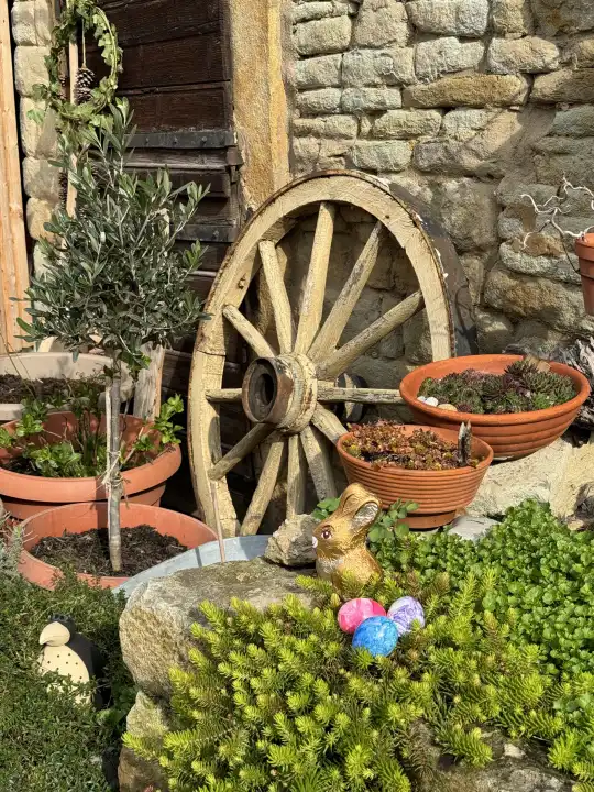 Romantic corner in the courtyard at Easter with Easter nests