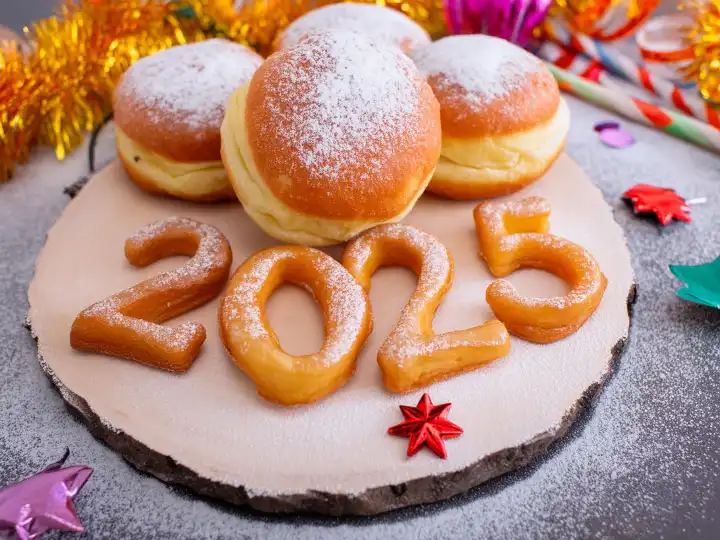 AI generated. New Year's Eve party with doughnuts and lard-baked annual numbers, colorful table decorations