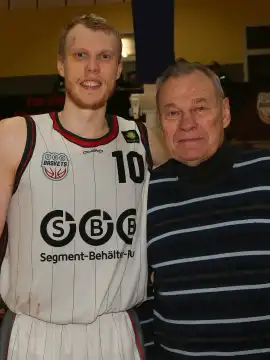 Former Soviet-Lithuanian basketball legend Modestas Juozapas Paulauskas with son of Modestas Paulauskas at SBB Baskets in Wolmirstedt on 23.12.2023