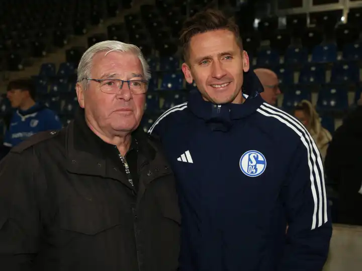 Soccer player Paul Seguin (Schalke 04) with father Wolfgang Paule Seguin (1.FC Magdeburg) after match - 2nd Bundesliga season 2023-24 1.FC Magdeburg - FC Schalke 04 on 24.02.2024 in MDCC Arena Magdeburg