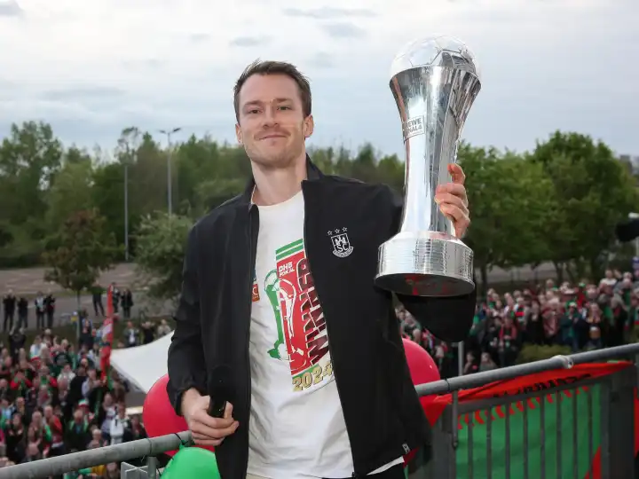 Swedish handball player Felix Claar (SC Magdeburg) with trophy at the reception of the current DHB Cup winner 2024 SC Magdeburg on 15.04.2024 at the GETEC Arena Magdeburg