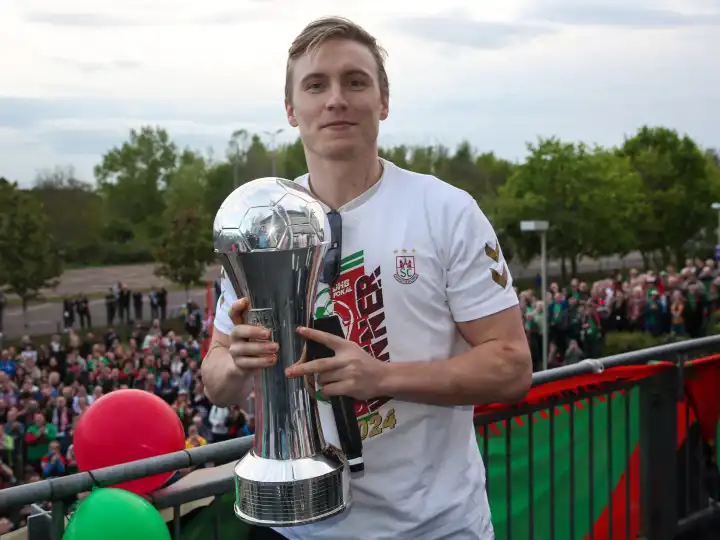 Icelandic handball player Gisli Kristjansson (SC Magdeburg) with trophy at the reception of the current DHB Cup winner 2024 SC Magdeburg on 15.04.2024 at the GETEC Arena Magdeburg