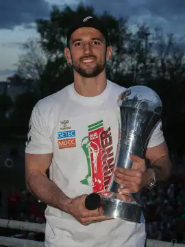 Swiss handball player Lucas Meister (SC Magdeburg) with trophy at the reception of the current DHB Cup winner 2024 SC Magdeburg on 15.04.2024 at the GETEC Arena Magdeburg